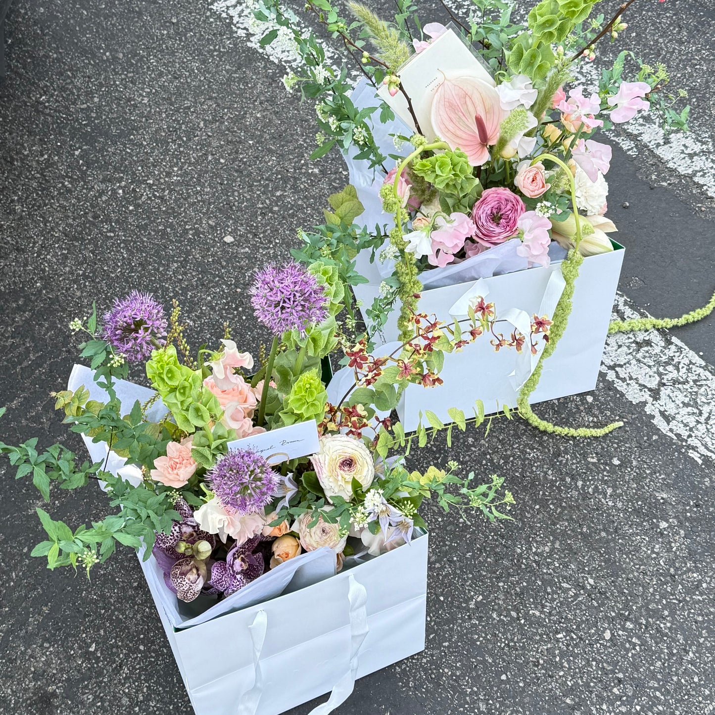 Designer's Choice bouquet in a glass vase